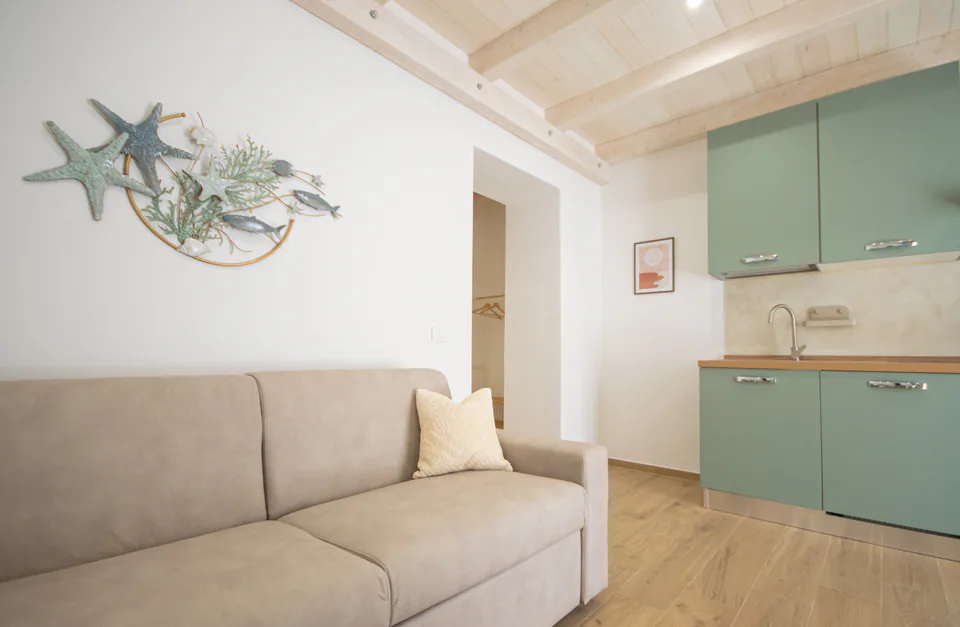 Divano letto e cucina